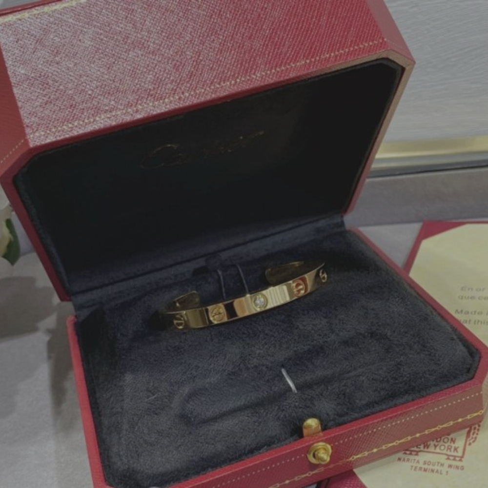 Cartier Gold Bracelet with Dot Diamond